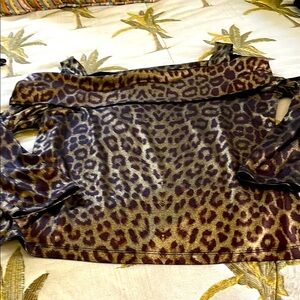 CLARAS Cheetah Stretch top with straps and off the shoulder detail. Size M